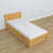 Lit pin naturel – tiroir na matelas, détails en bois, Nizio Home