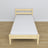 Clear pine bed in a child’s room – Scandinavian arrangement, wooden