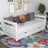 Sofa-lit en bois blanc – tiroir ouvert, rangement pour literie